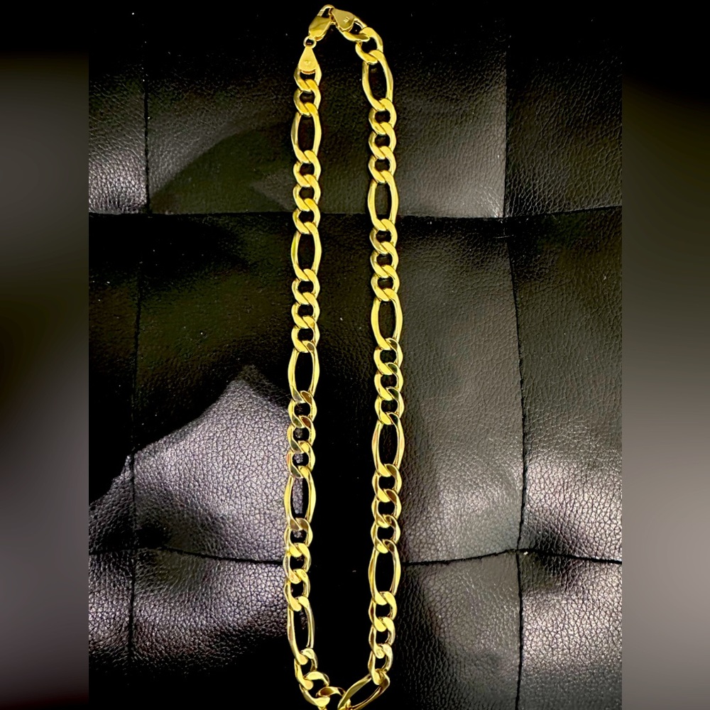10kt gold figaro chain 33.7 gms, 10kt gold and 12mm, 22 inch